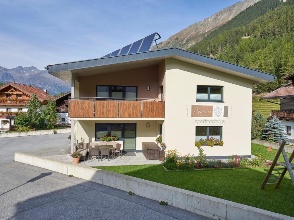 a house with a solar panel on the roof at Apartment Agnesn-2 by Interhome in Längenfeld