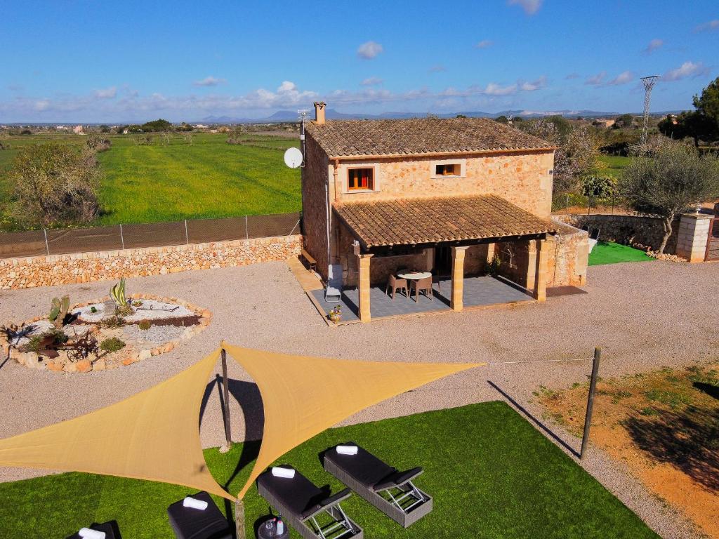 an aerial view of a house with a pavilion at Finca Barralina in Campos