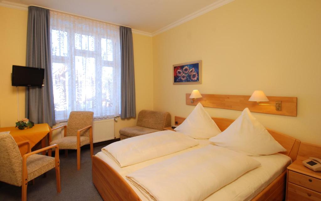 Lova arba lovos apgyvendinimo įstaigoje Hotel Münchner Löwenbräu