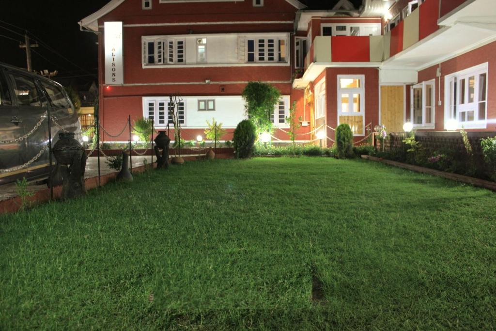 Zahrada ubytování Walisons Hotel
