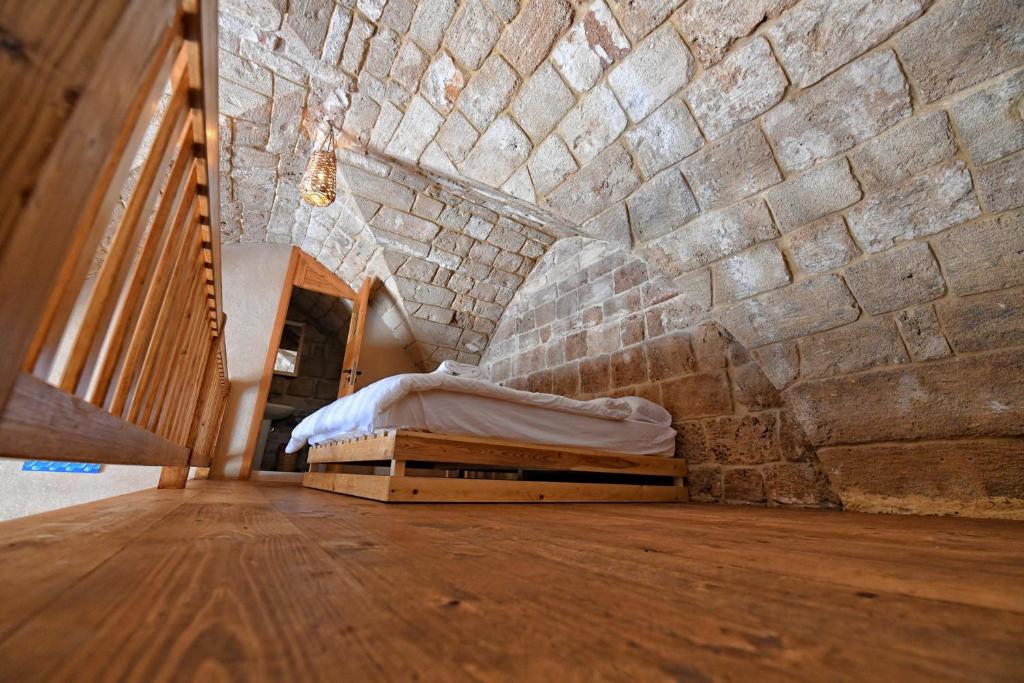 Postel nebo postele na pokoji v ubytování Old Town Guesthouses