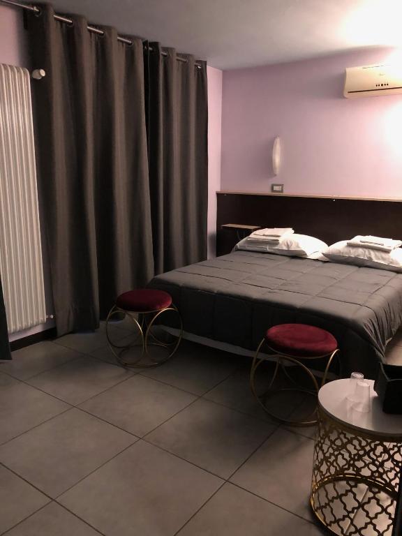 Posteľ alebo postele v izbe v ubytovaní Villa Camilla Milano