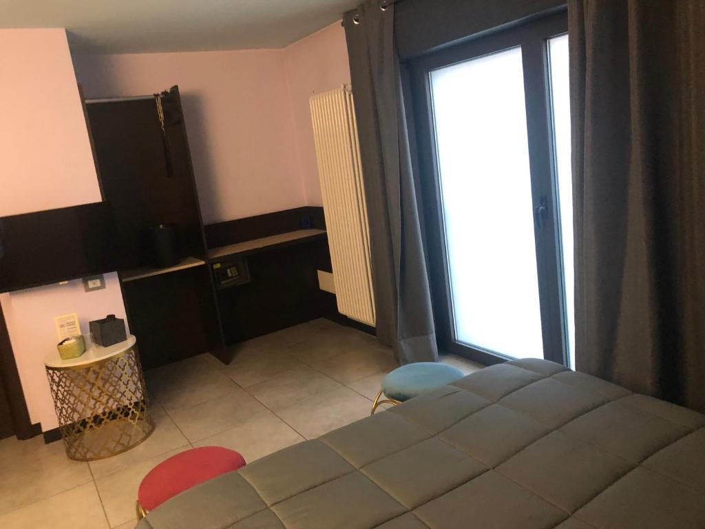 Posteľ alebo postele v izbe v ubytovaní Villa Camilla Milano
