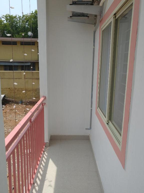 Balkón nebo terasa v ubytování Sai Inn Mysore