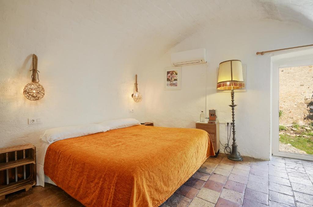 Postel nebo postele na pokoji v ubytování B&B Mas Torrencito Pet Friendly