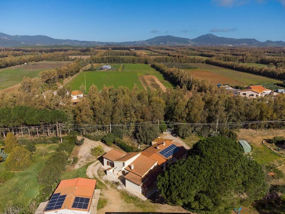 an aerial view of a house with solar panels at AffittaSardegna-CASA LA VIGNA in Alghero