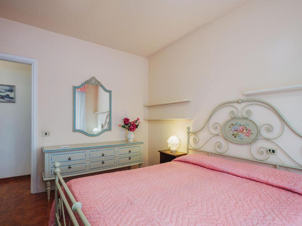 Posteľ alebo postele v izbe v ubytovaní Apartment La Rocchetta by Interhome