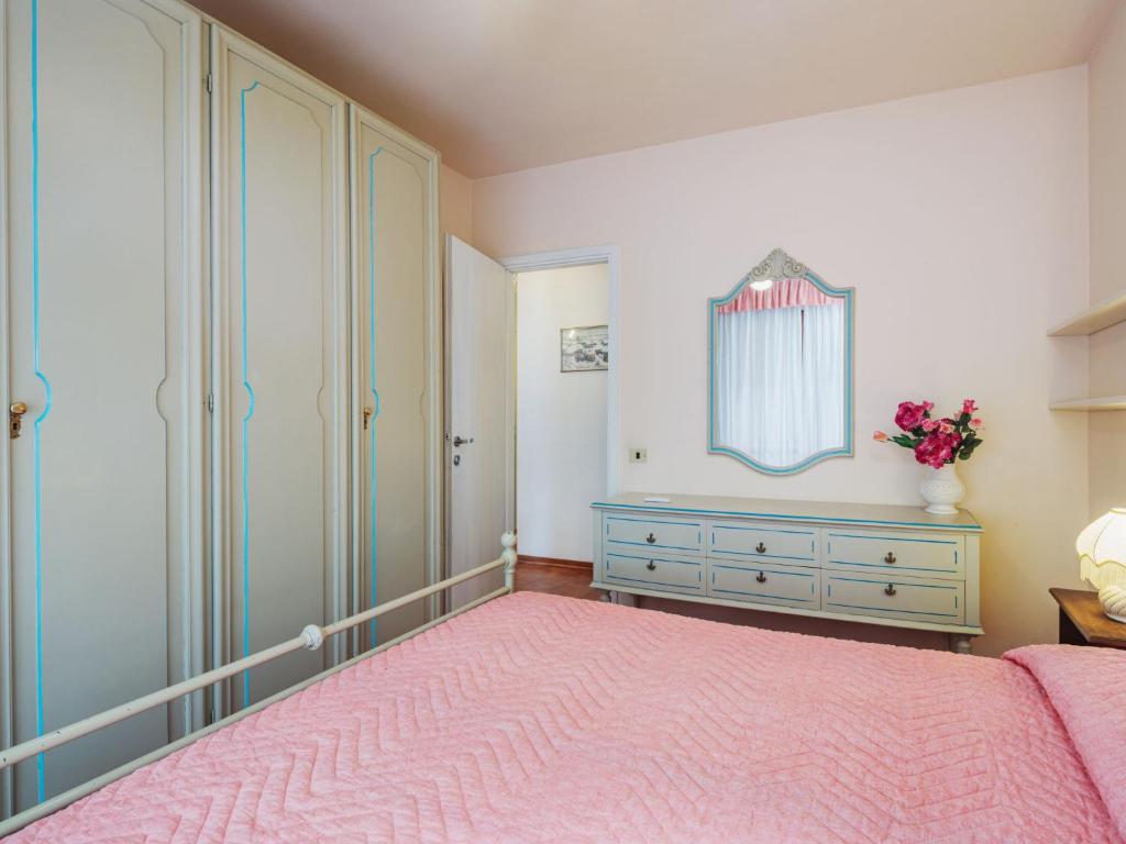 Posteľ alebo postele v izbe v ubytovaní Apartment La Rocchetta by Interhome