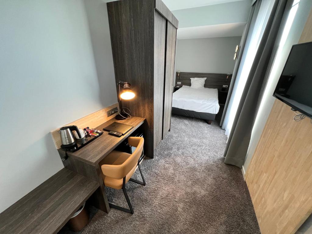 Postel nebo postele na pokoji v ubytování Best Western Hotel Royal Centre