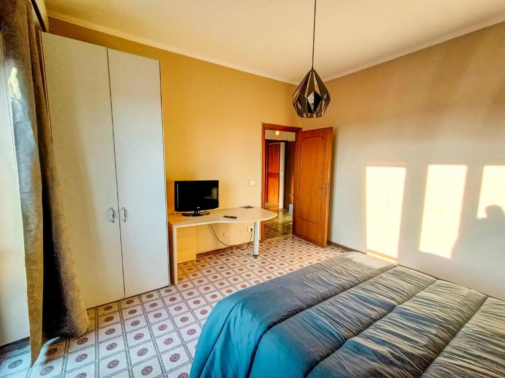 A television and/or entertainment centre at Malù House