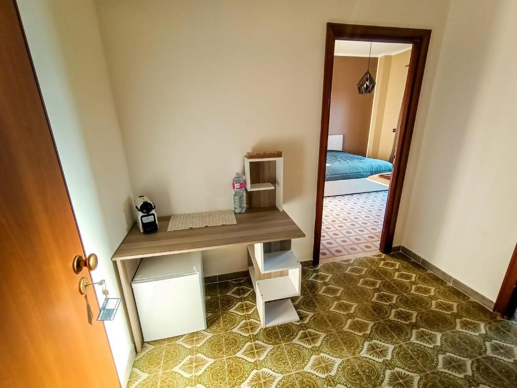 A bed or beds in a room at Malù House