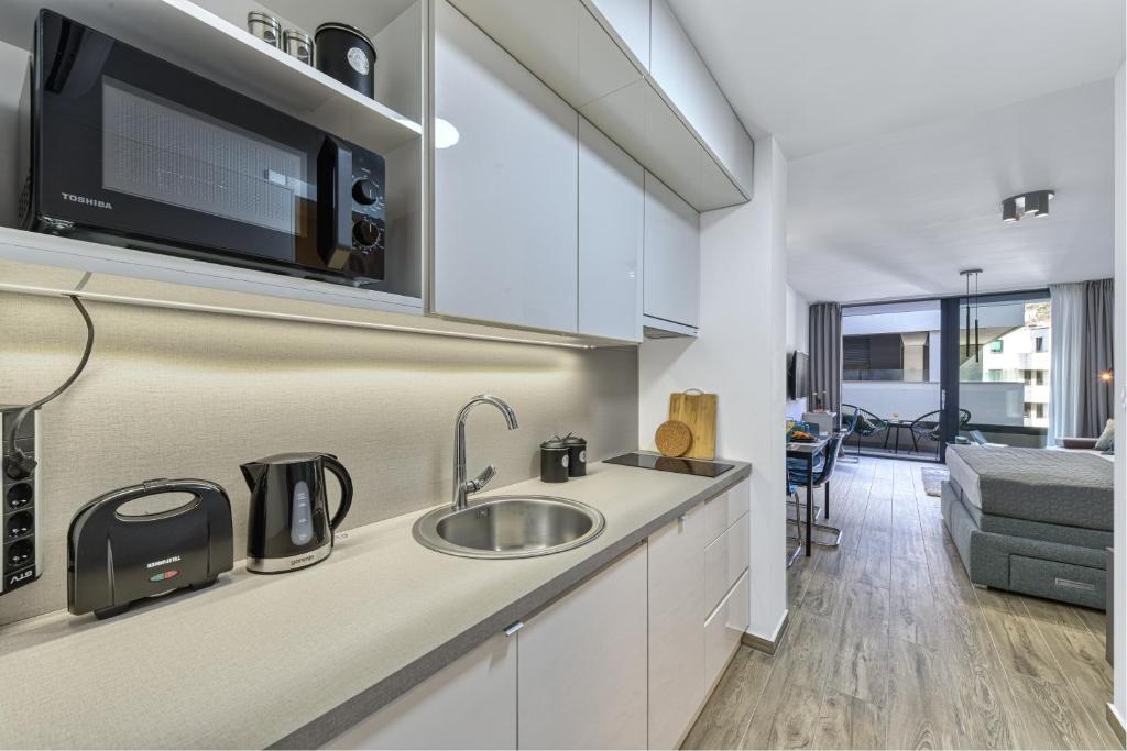 Kuchyňa alebo kuchynka v ubytovaní Apartments Hica