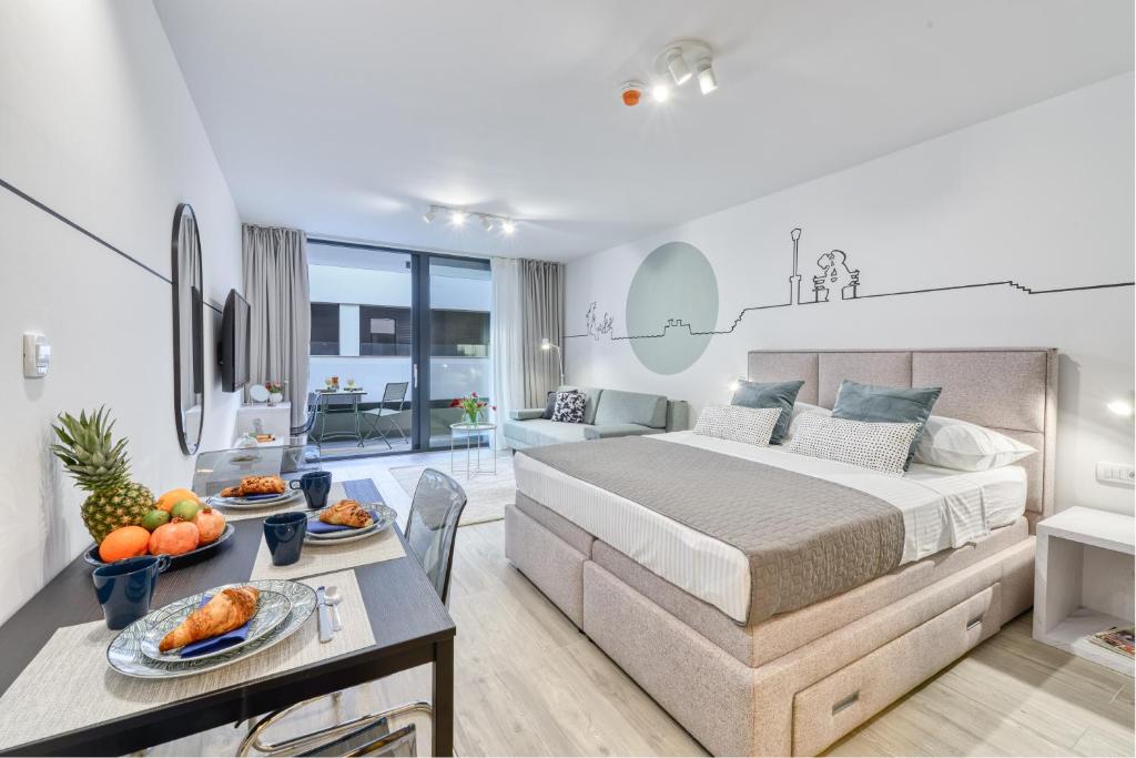 Posteľ alebo postele v izbe v ubytovaní Apartments Hica