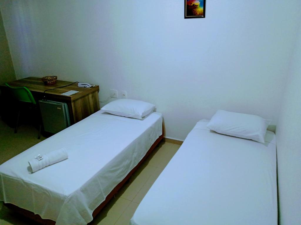 Postel nebo postele na pokoji v ubytování Hotel BLESS