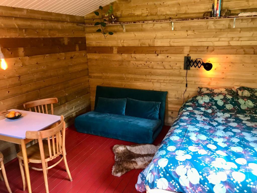 Postel nebo postele na pokoji v ubytování Arkeo - Luxury tents and cabins at the river