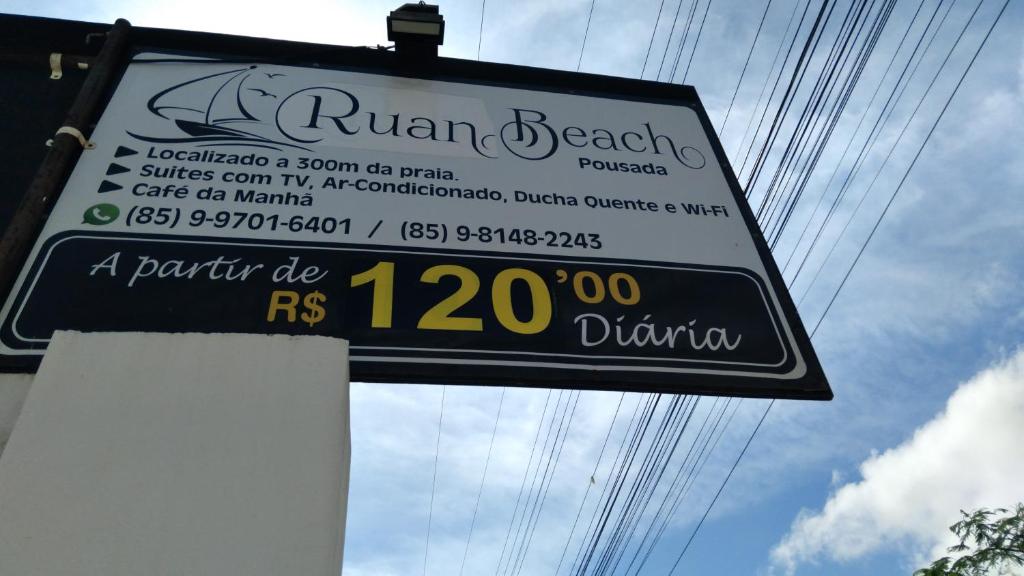 um sinal para um ruman beachedasteryasteryasteryasteryasteryasteryasteryasteryastery em Ruan Beach em Guajiru