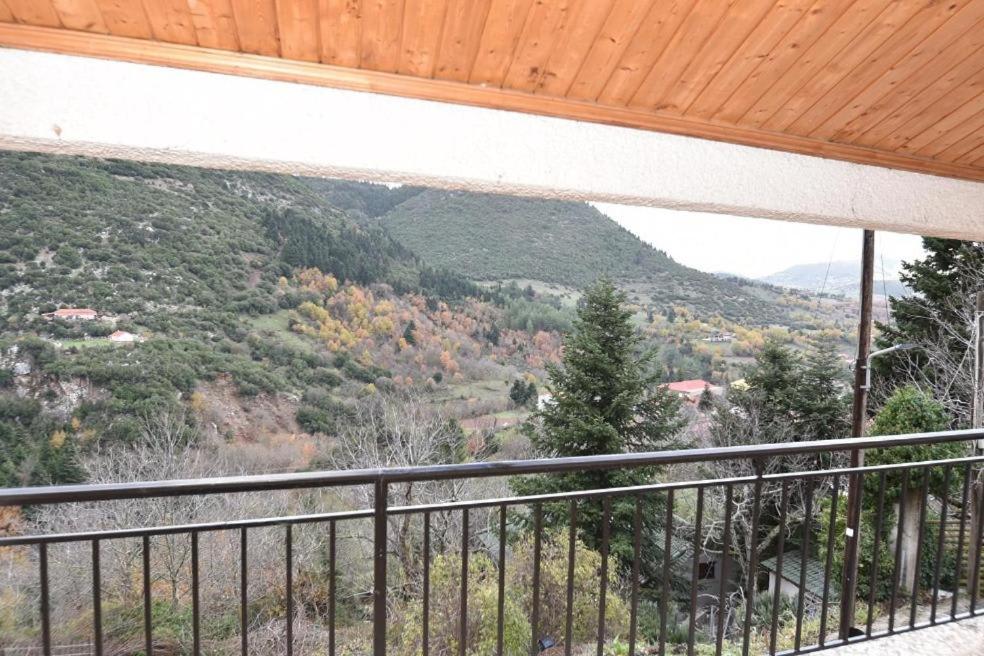 a balcony with a view of a mountain at Villa Erika Mountain Escape in Áno Vlasía