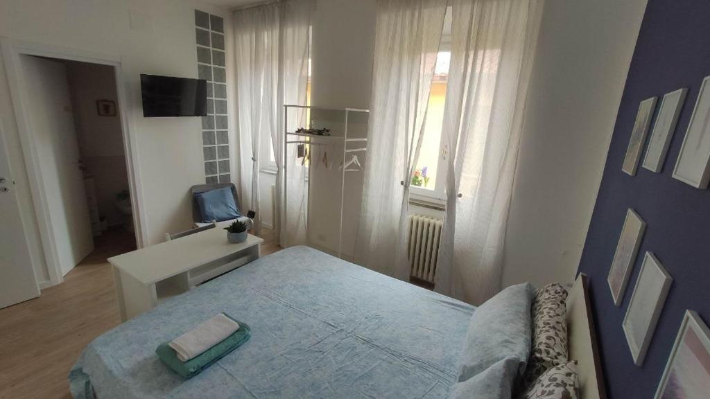 TV a/nebo společenská místnost v ubytování B&B Bel Fiore