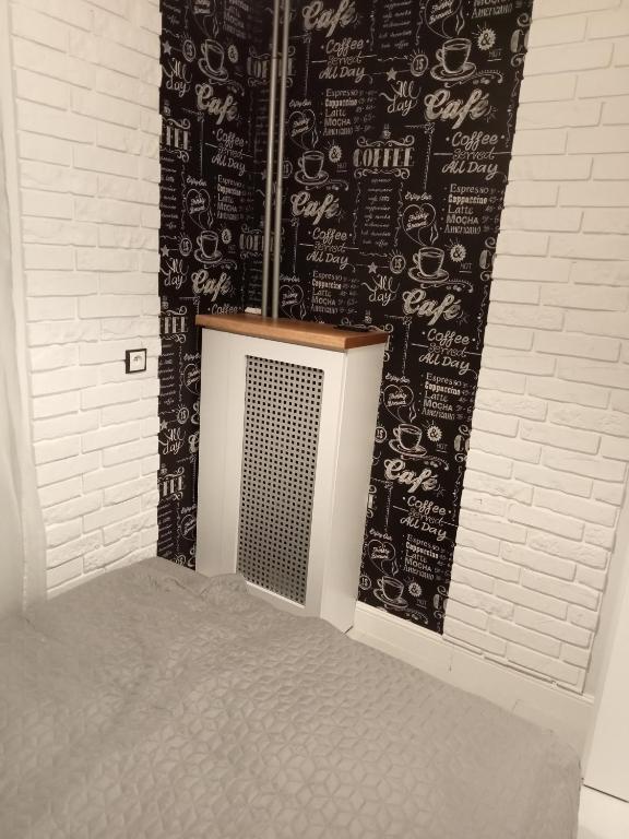 Posteľ alebo postele v izbe v ubytovaní Apartament Anita