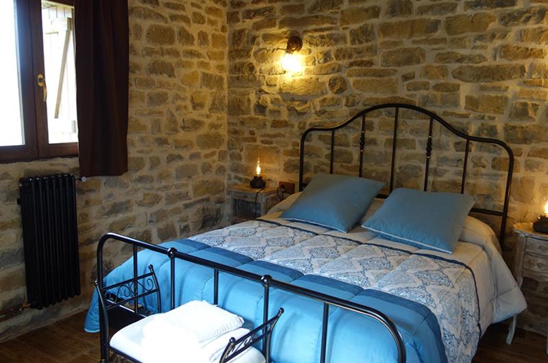 Postel nebo postele na pokoji v ubytování Casa Notario