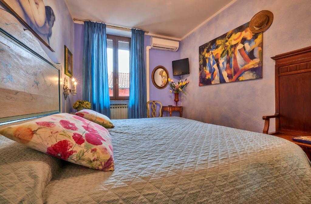 Posteľ alebo postele v izbe v ubytovaní B&B - FORESTERIA - Frontelago Lake Como