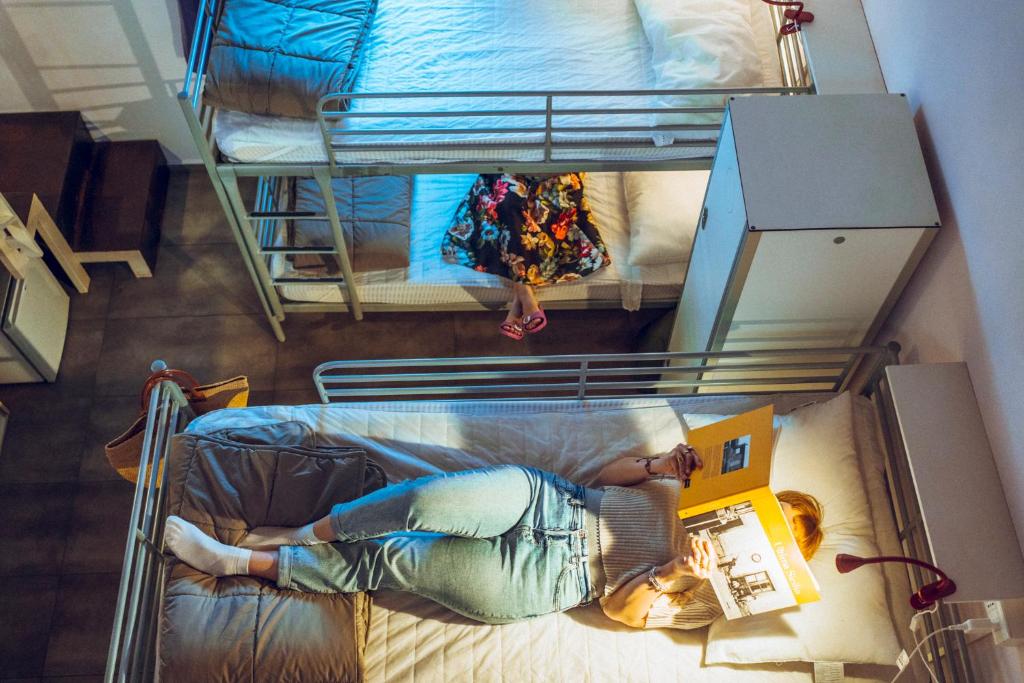 Postel nebo postele na pokoji v ubytování LoL Hostel Siracusa