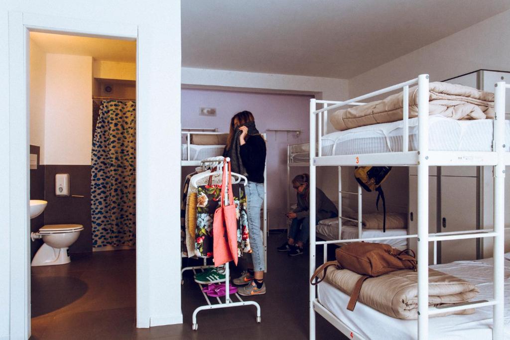 Postel nebo postele na pokoji v ubytování LoL Hostel Siracusa