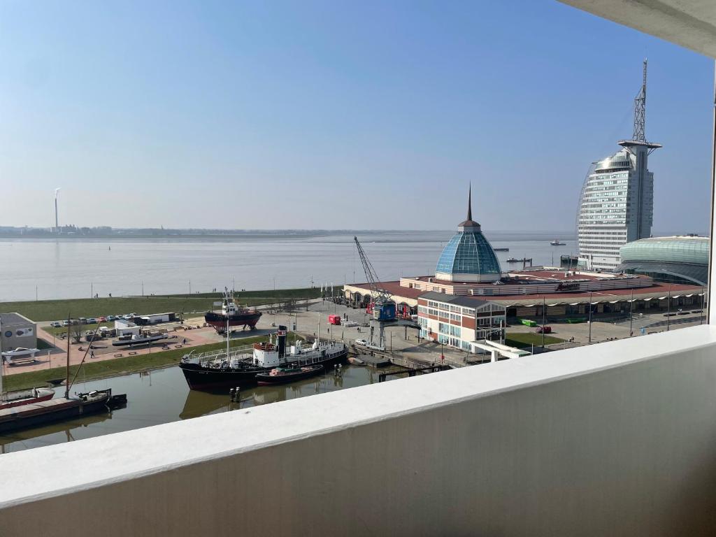 a view of a marina with boats in the water at Weser-Traum in Bremerhaven