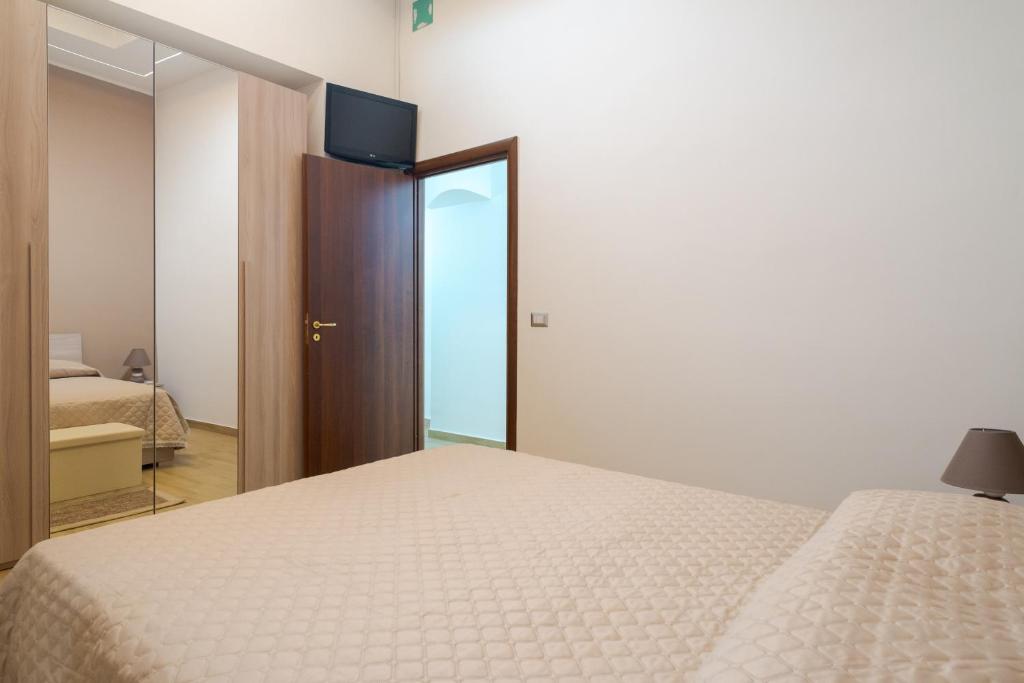 Posteľ alebo postele v izbe v ubytovaní Barraco's House