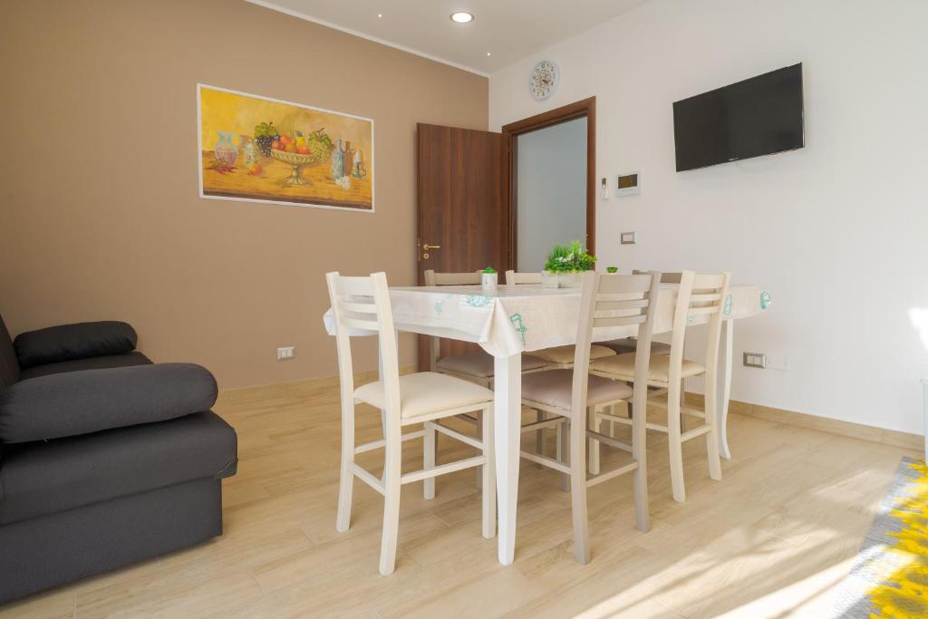 Televízia a/alebo spoločenská miestnosť v ubytovaní Barraco's House