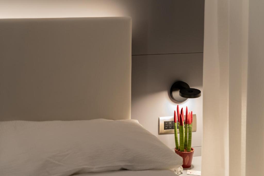 Posteľ alebo postele v izbe v ubytovaní Hotel Shangri-La