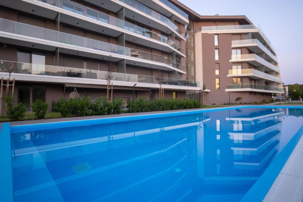 The swimming pool at or close to MyFlat Coral Beach Apartment