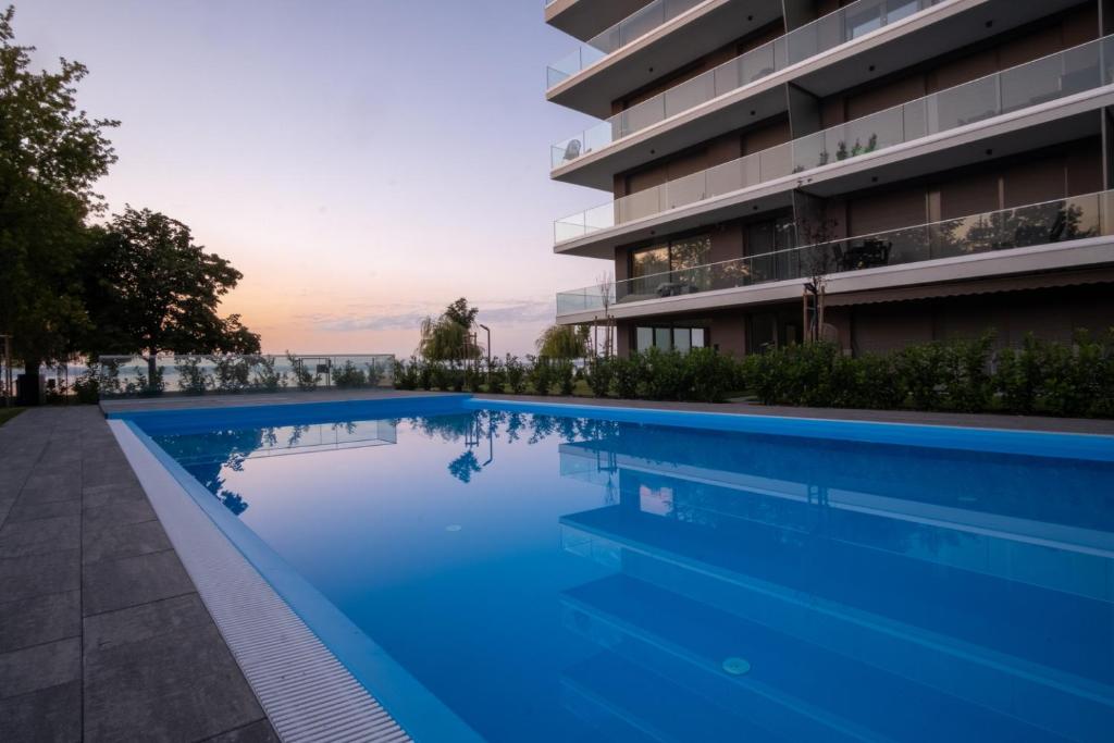 The swimming pool at or close to MyFlat Coral Beach Apartment