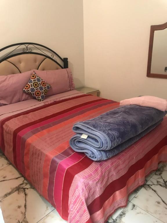 Voodi või voodid majutusasutuse Dar Ibrahim toas