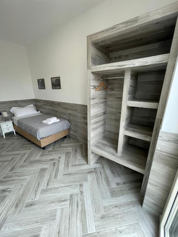 Postel nebo postele na pokoji v ubytování Holiday Rooms Rho