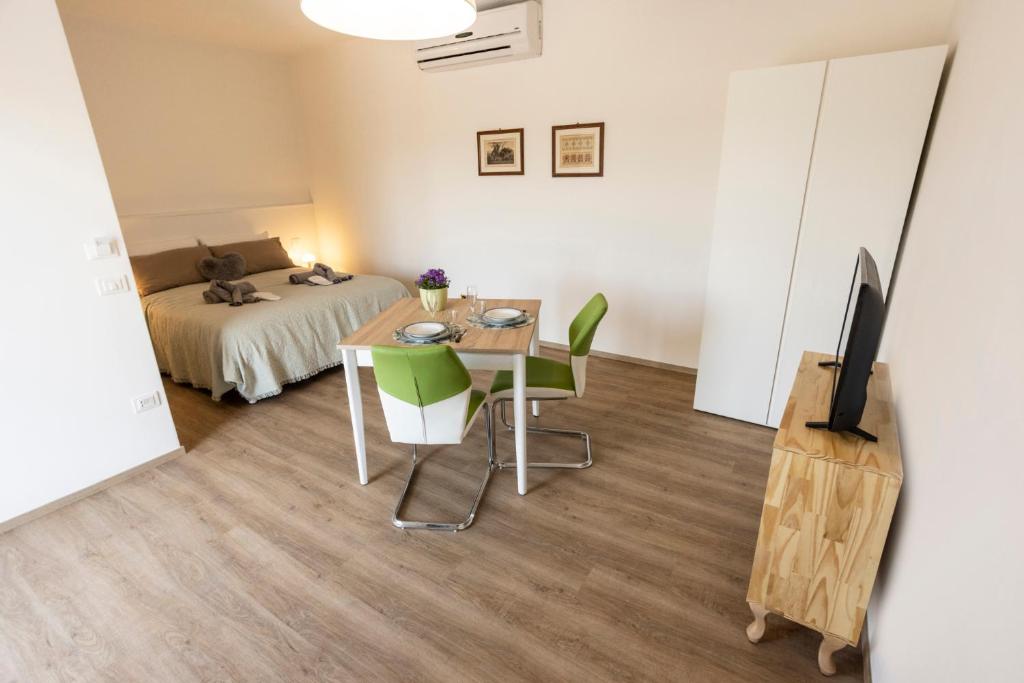 Posteľ alebo postele v izbe v ubytovaní BORGOROMA - Business & Apartments