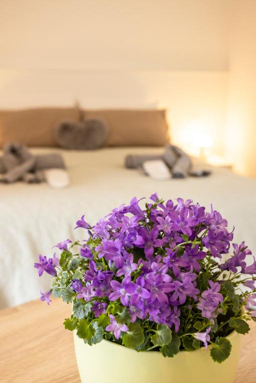 Posteľ alebo postele v izbe v ubytovaní BORGOROMA - Business & Apartments