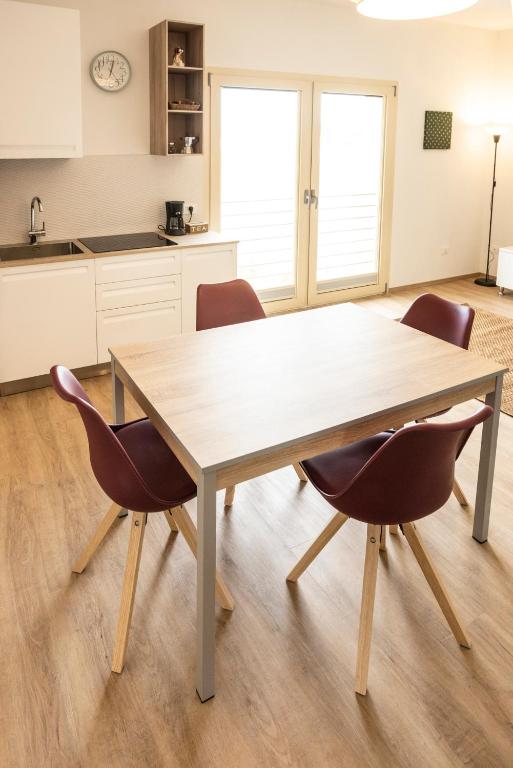 Kuchyňa alebo kuchynka v ubytovaní BORGOROMA - Business & Apartments