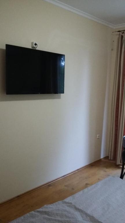 Telewizja i/lub zestaw kina domowego w obiekcie Gimi Vendégház