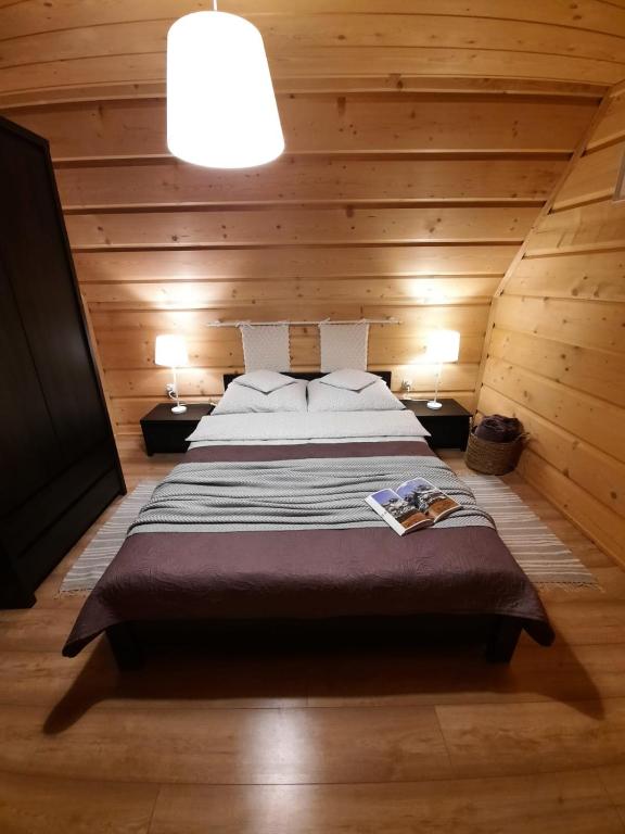 Postel nebo postele na pokoji v ubytování Domek Pod Ubocom
