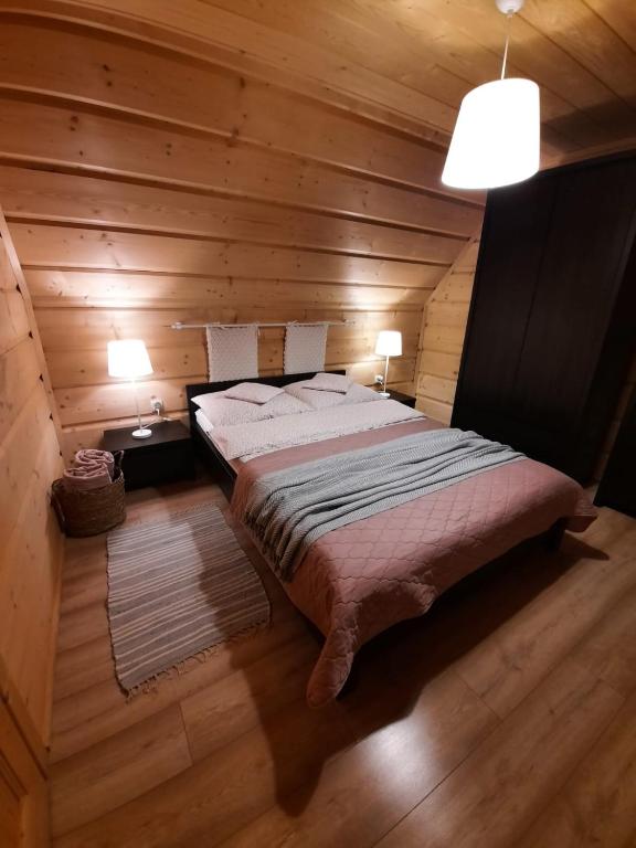 Postel nebo postele na pokoji v ubytování Domek Pod Ubocom