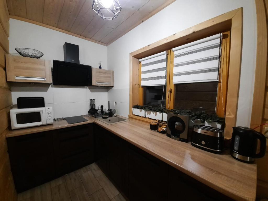 Kuchyň nebo kuchyňský kout v ubytování Domek Pod Ubocom