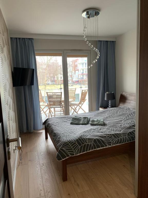 Posteľ alebo postele v izbe v ubytovaní LUX Apartament Polanki - Kołobrzeg