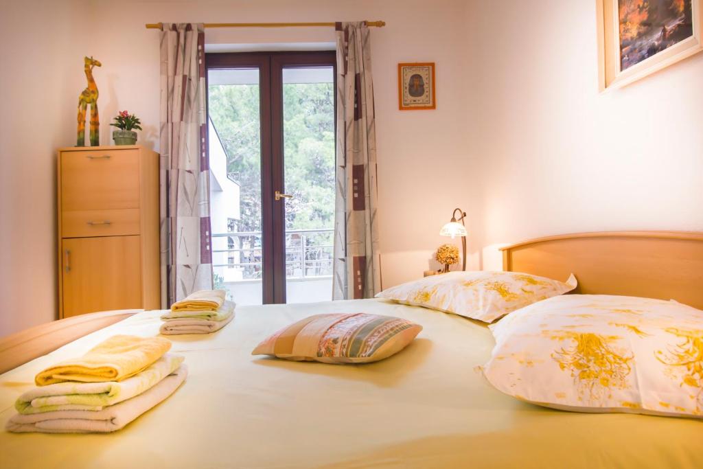 Posteľ alebo postele v izbe v ubytovaní House Kvin