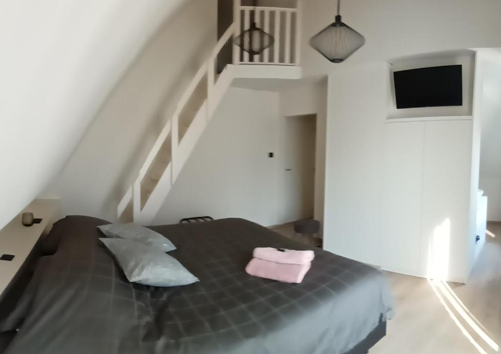 Postel nebo postele na pokoji v ubytování B&B Snelleghem