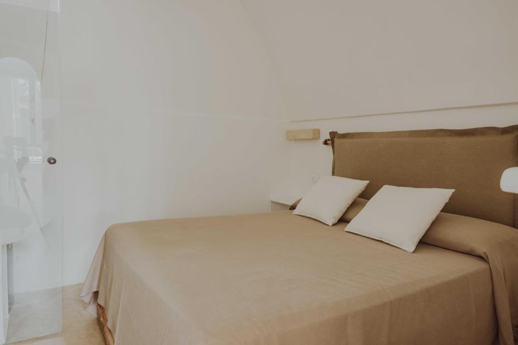 Postel nebo postele na pokoji v ubytování Badia del Casale