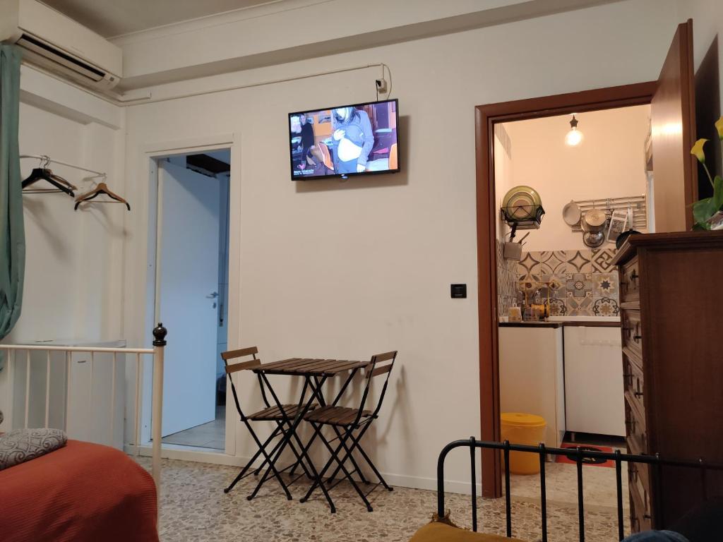 Telewizja i/lub zestaw kina domowego w obiekcie Roma Trastevere Station