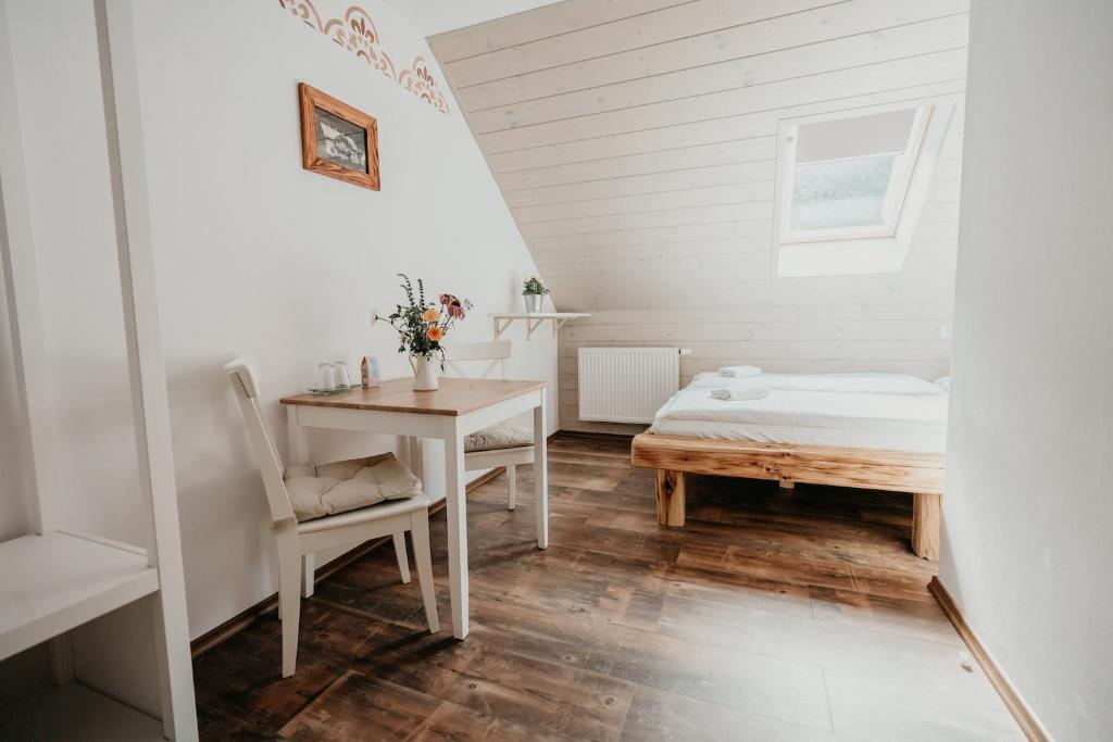 Postel nebo postele na pokoji v ubytování Penzion Račí údolí