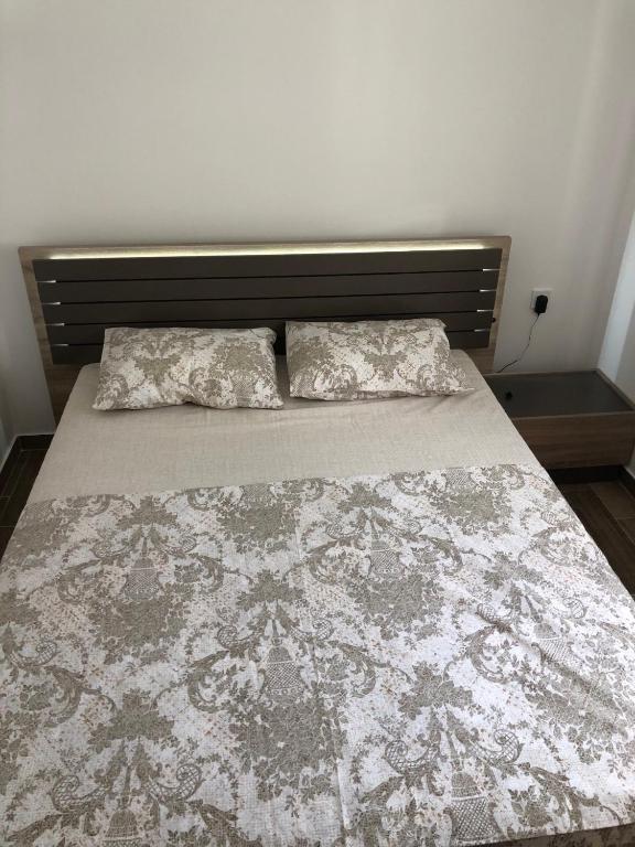 Postel nebo postele na pokoji v ubytování Apartmani Vanja