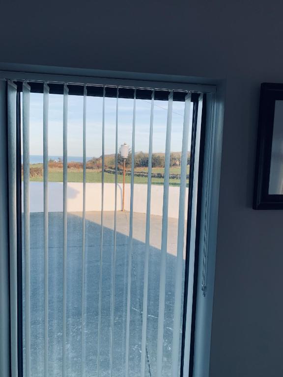 Balkón nebo terasa v ubytování Atlantic Bay Cottage